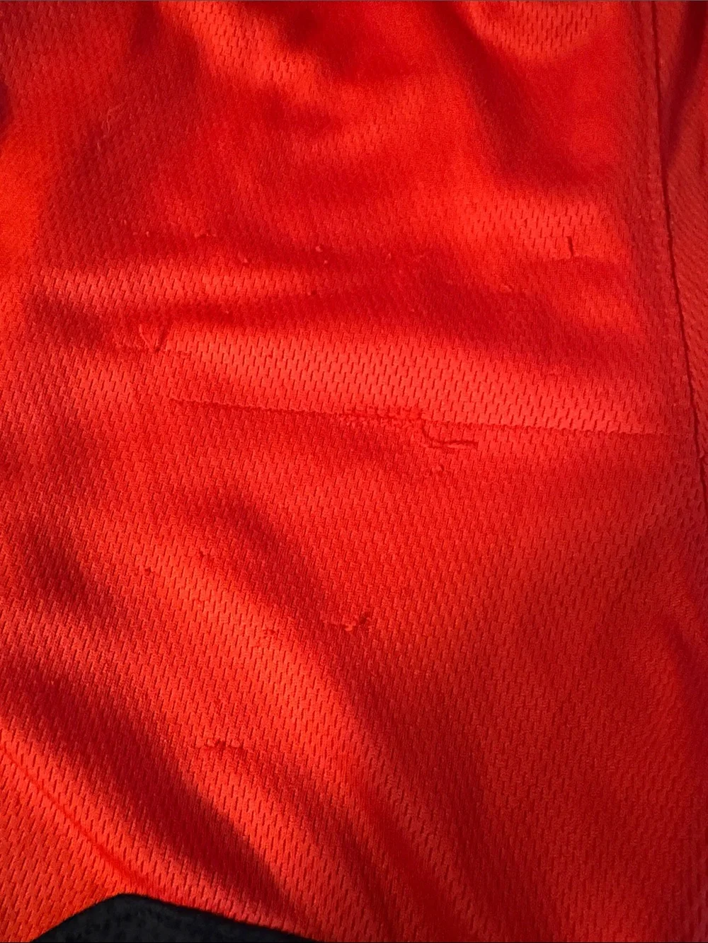 Nike Red Mesh Sports Shorts with Black Swoosh